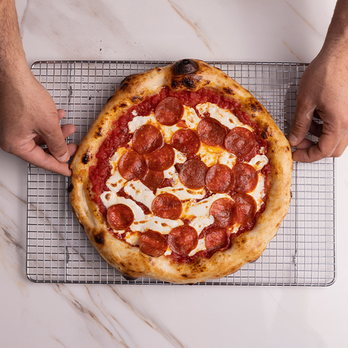 Un Bocado de Satisfacción: La Pizza de Pepperoni
